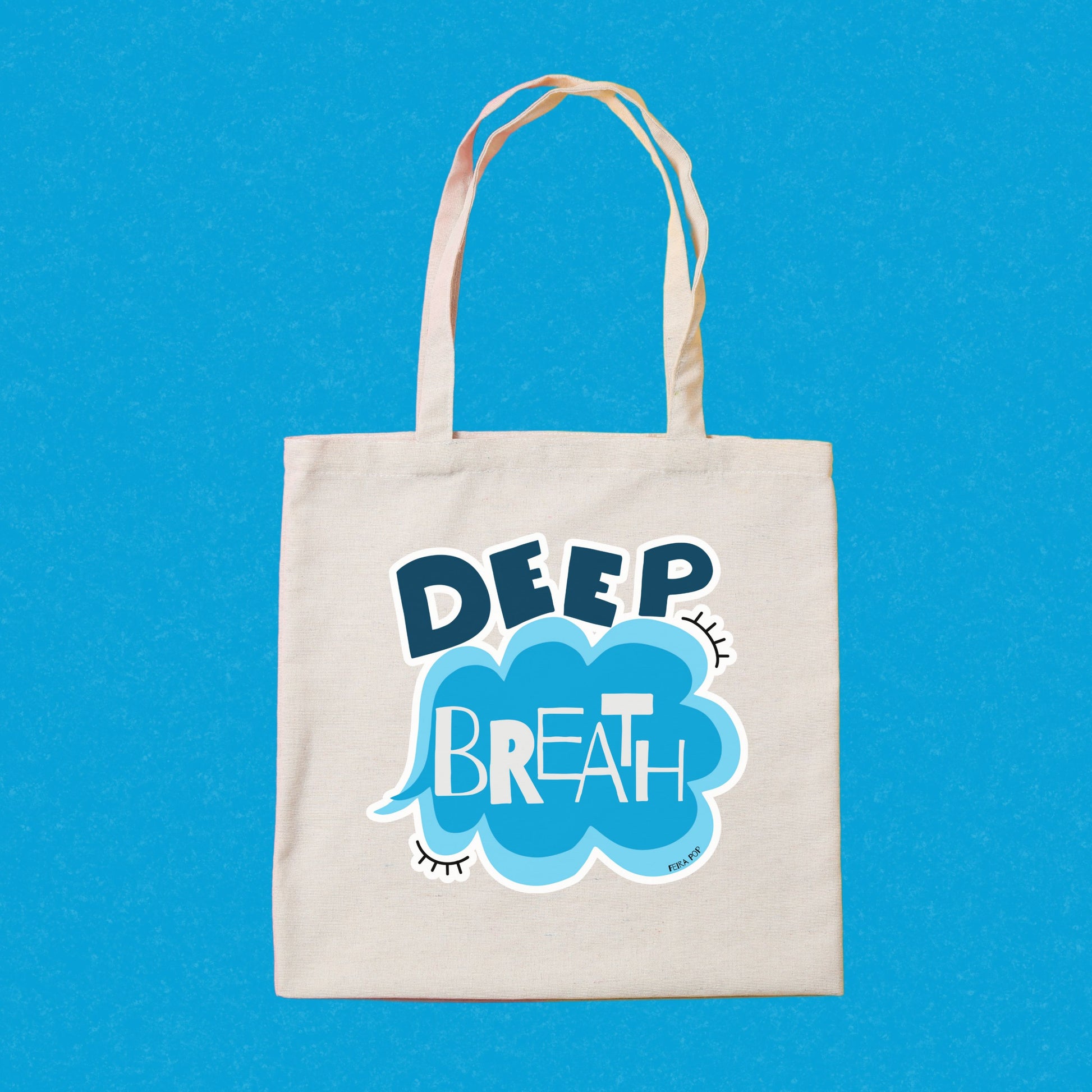 Deep Breath Tote Bag with original drawing of a serene cloud and the words Deep Breath written across it, perfect for carrying daily essentials and adding a touch of whimsy to your outfit.