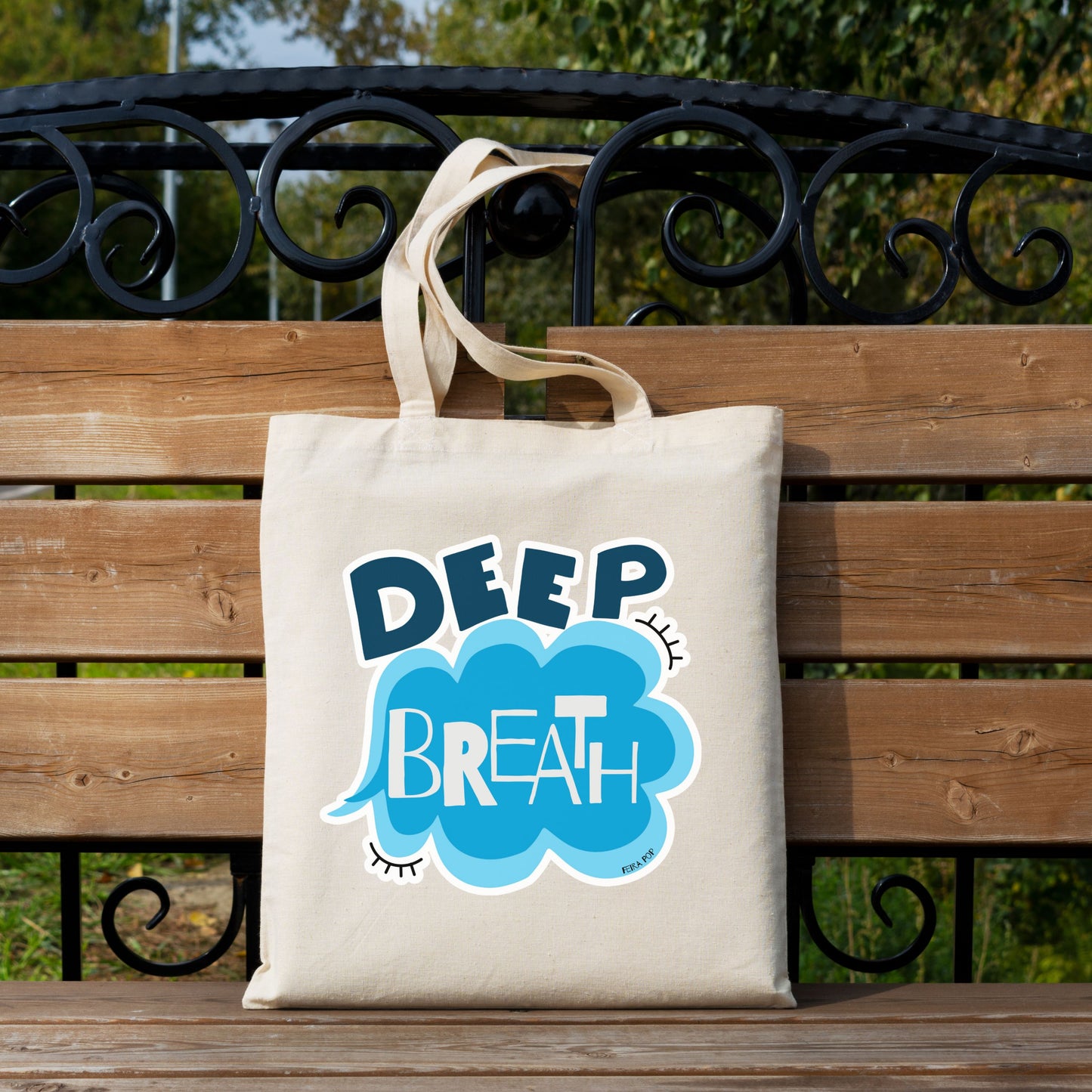 Deep Breath Tote Bag with original drawing of a serene cloud and the words Deep Breath written across it, perfect for carrying daily essentials and adding a touch of whimsy to your outfit.