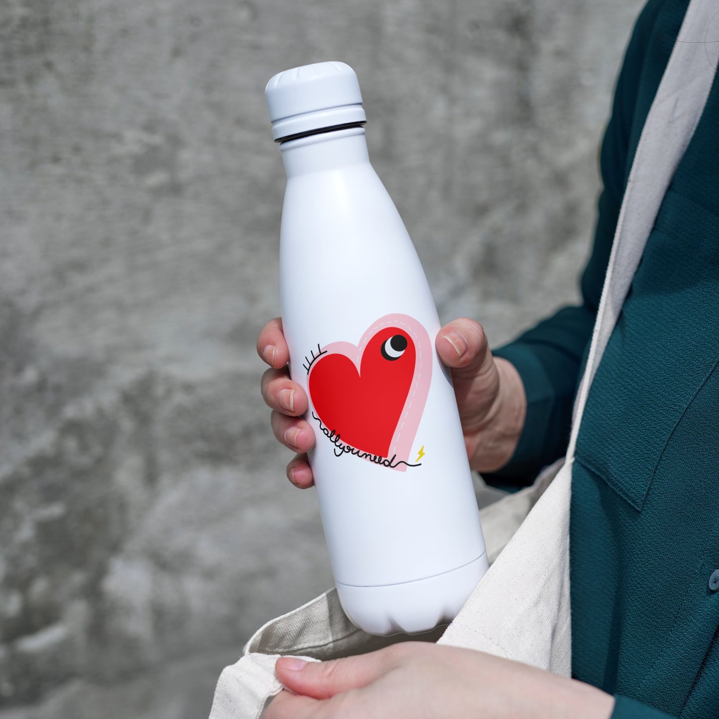 Sticker with the phrase 'All You Need' featuring a drawing of a big red heart with one eye. Perfect for laptops, notebooks, and water bottles, this quirky design adds a touch of whimsy and spreads love and good vibes.