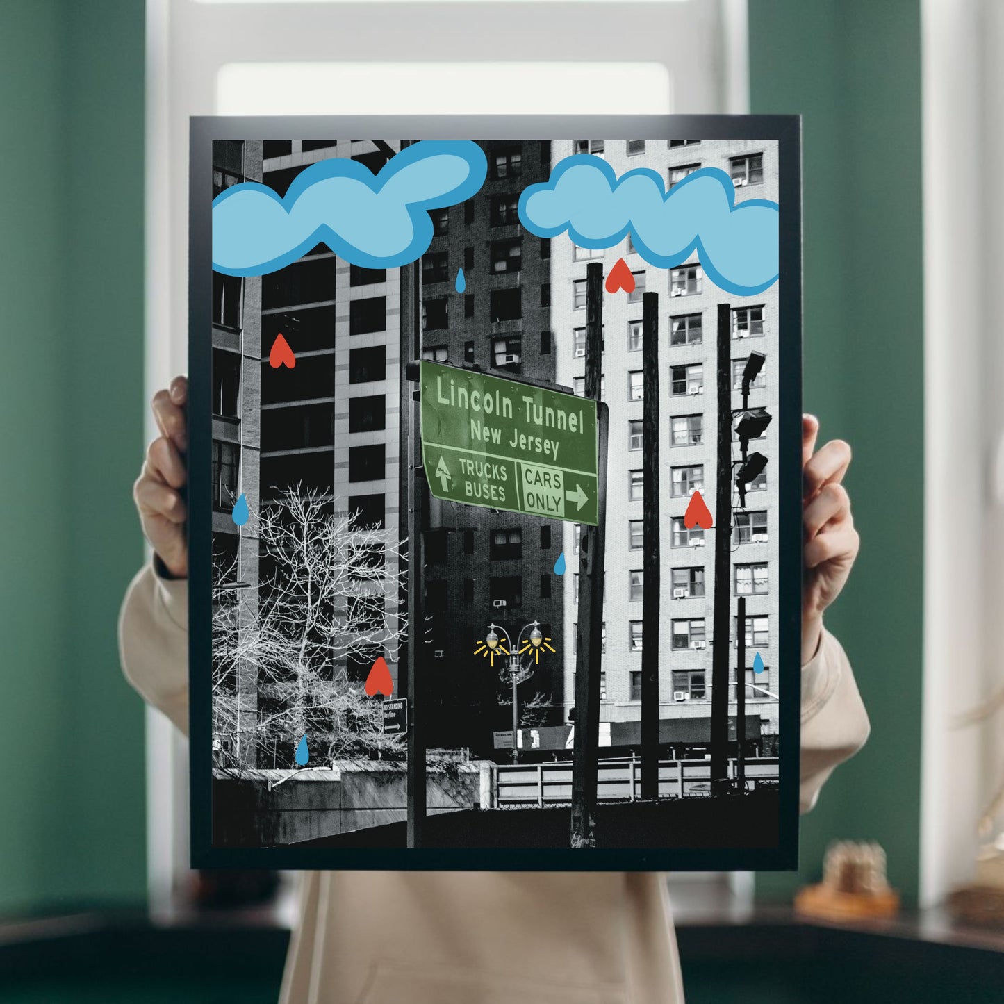 Black and white art print of the Lincoln Tunnel with illustrated clouds raining hearts and a glowing streetlight. Urban wall art mixing photography and illustration, perfect for New York lovers and modern home décor.