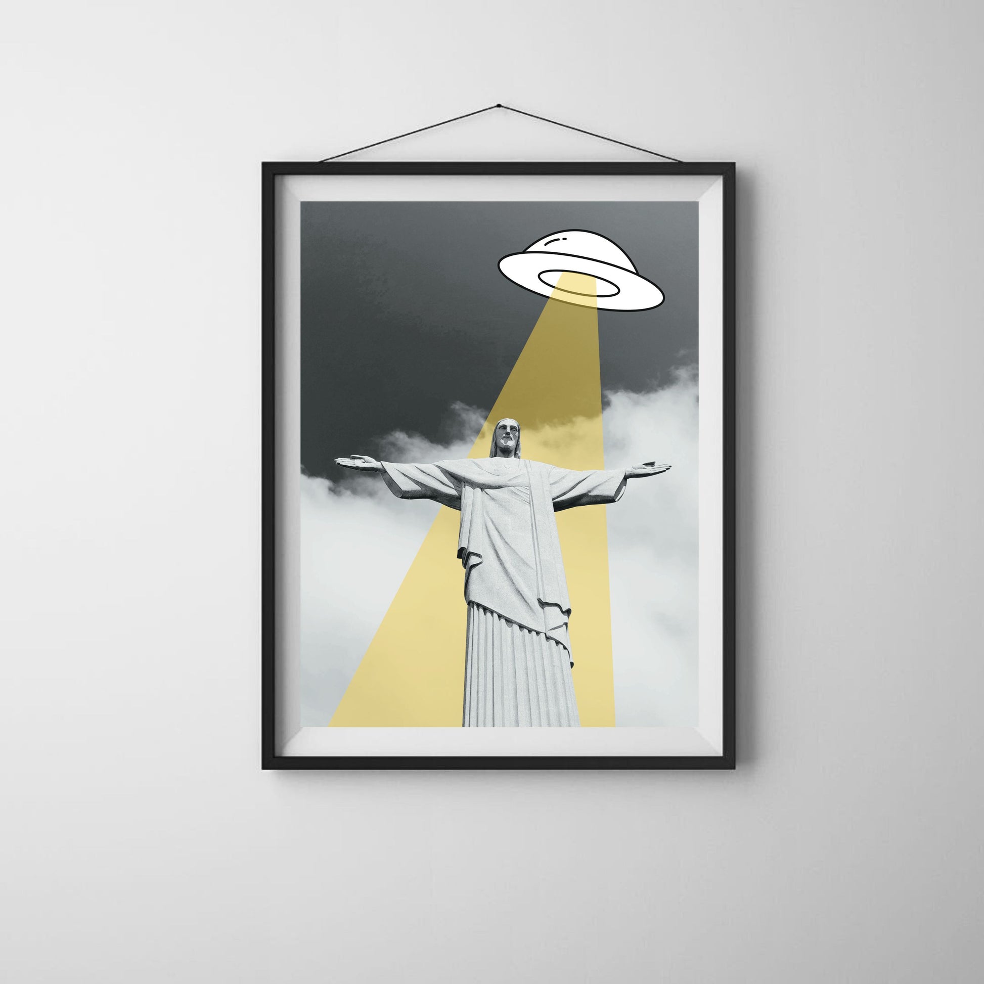 Black and white art print of Cristo Redentor in Rio de Janeiro with a playful illustrated UFO shining a beam of light, funny sci-fi wall decor, modern alien artwork, unique Brazil travel gift.