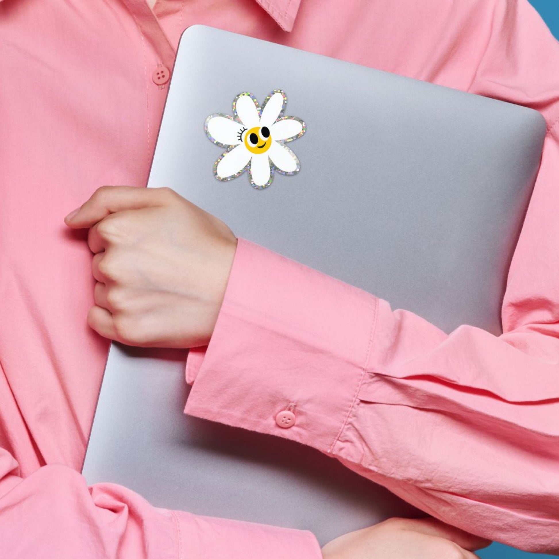 Glitter white daisy sticker with a smiley face, perfect for adding a touch of whimsy and positivity to your belongings.