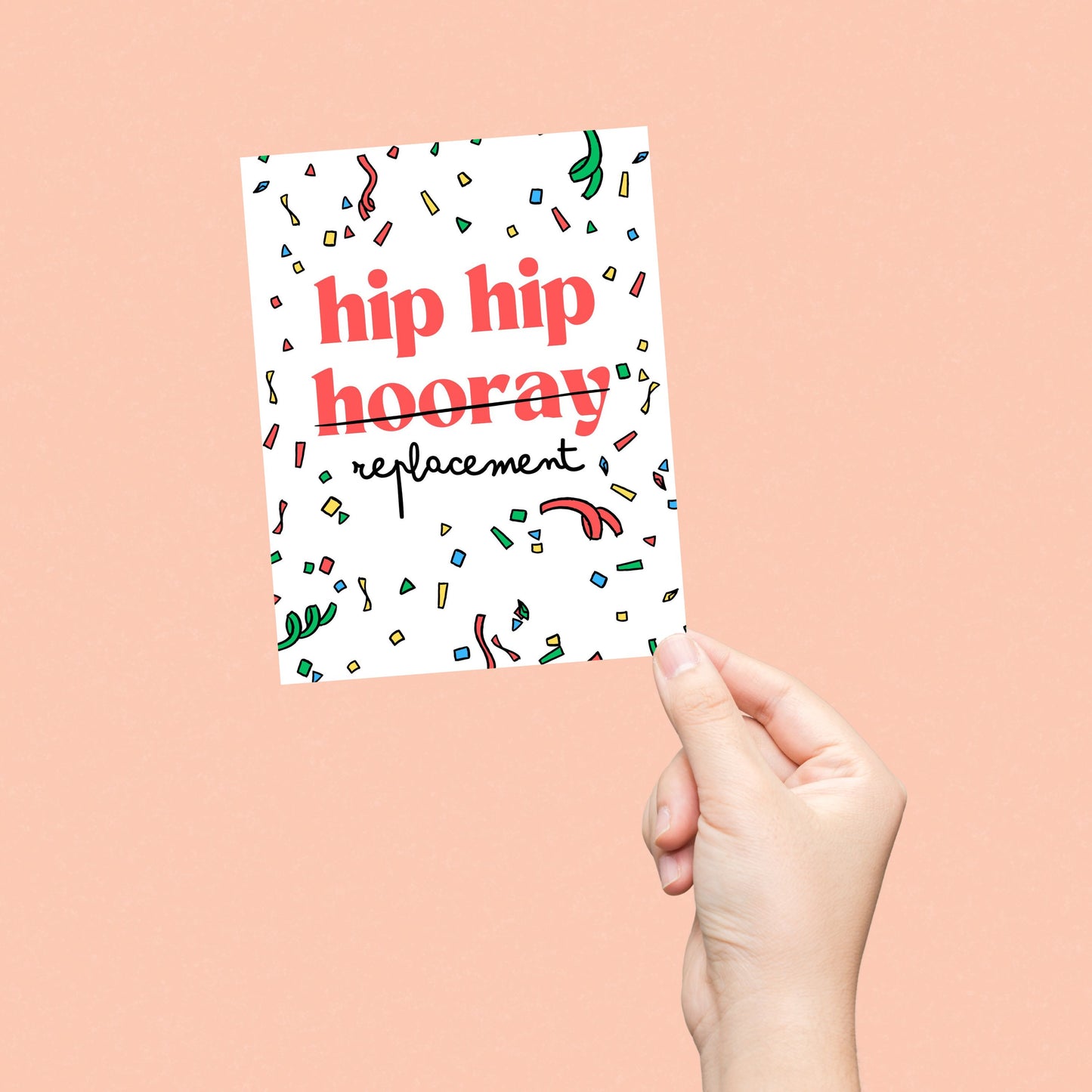 Birthday greeting card with the phrase Hip Hip Hooray Replacement on a confetti-filled background, with "hooray" crossed out and replaced with "replacement." Perfect for celebrating birthdays with a great laugh.