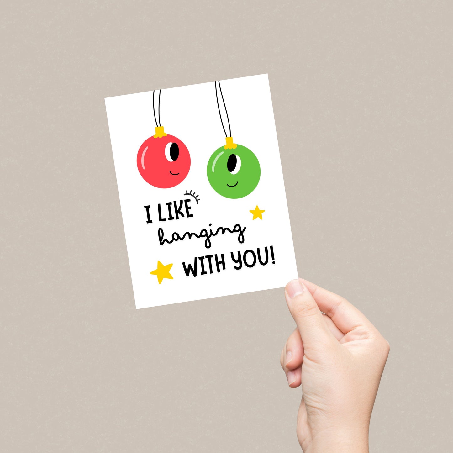 Christmas greeting card with two festive ornaments, one red and one green, and the playful phrase "I Like Hanging With You" in bold letters. Perfect for spreading holiday cheer, this funny card is ideal for friends, family, or loved ones.