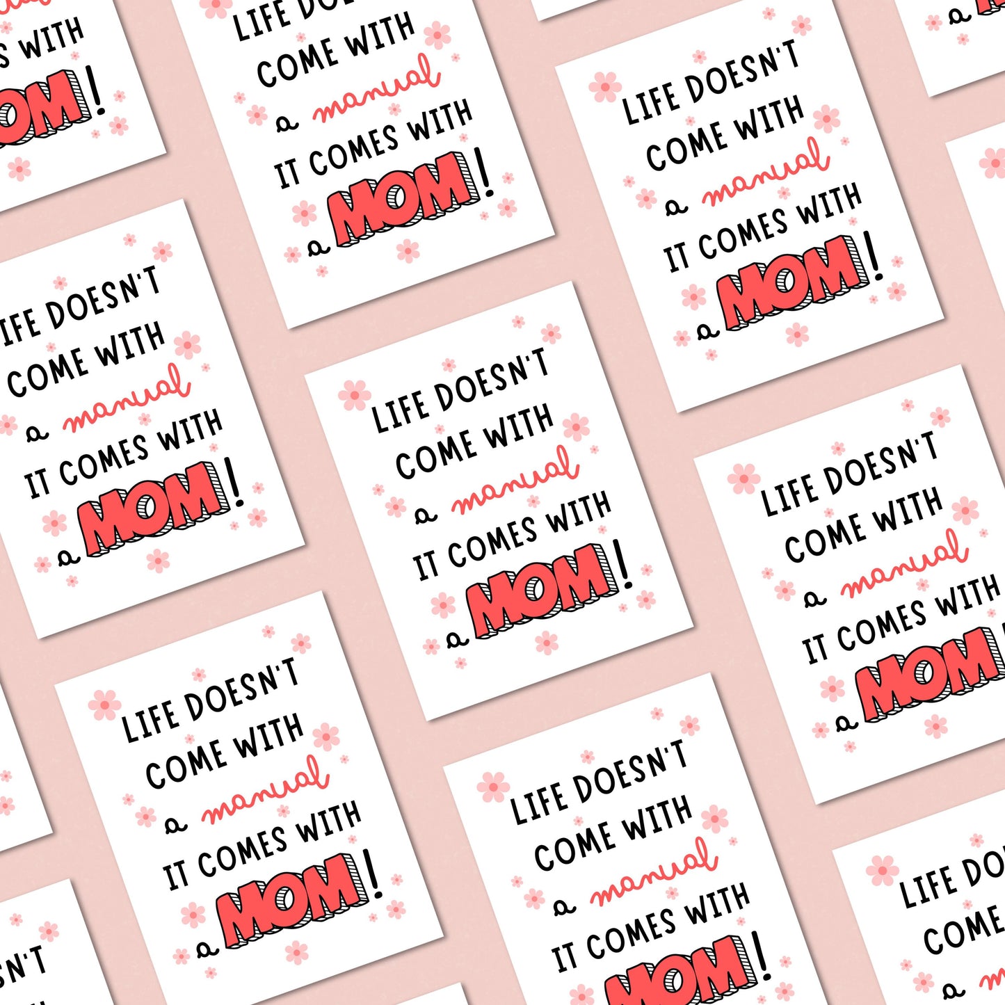 Mother's Day greeting card with colorful floral design and the phrase "Life Doesn't Come With A Manual It Comes With A Mom", perfect for funny and heartfelt messages for moms. Great card for Mother's Day or mom's birthday.