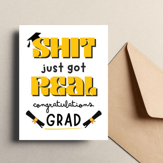 Funny graduation card with a black graduation cap, two rolled diplomas, and the phrase "Shit Just Got Real, Congratulations Grad" in bold letters. Perfect for high school or college graduates with a sense of humor.