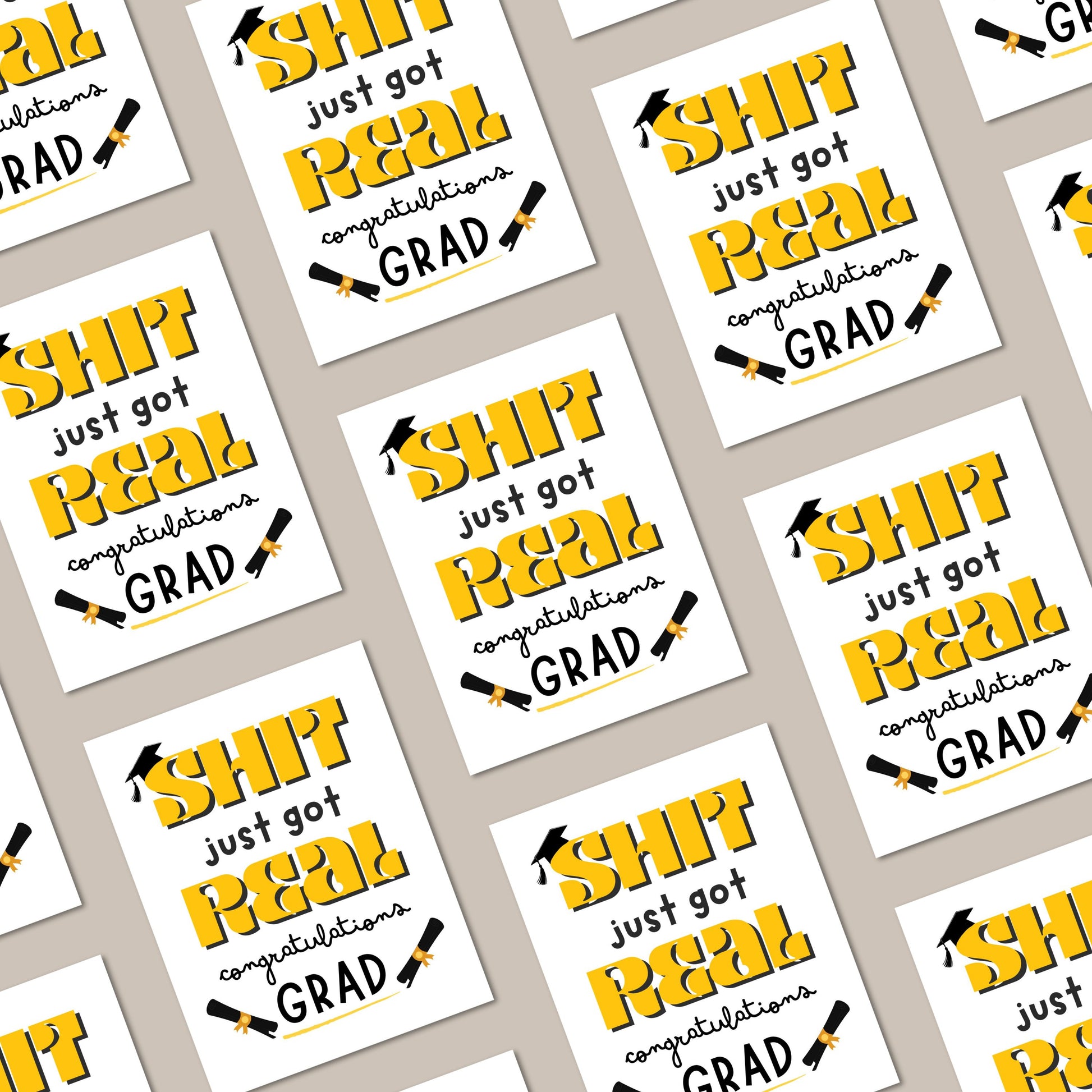 Funny graduation card with a black graduation cap, two rolled diplomas, and the phrase "Shit Just Got Real, Congratulations Grad" in bold letters. Perfect for high school or college graduates with a sense of humor.