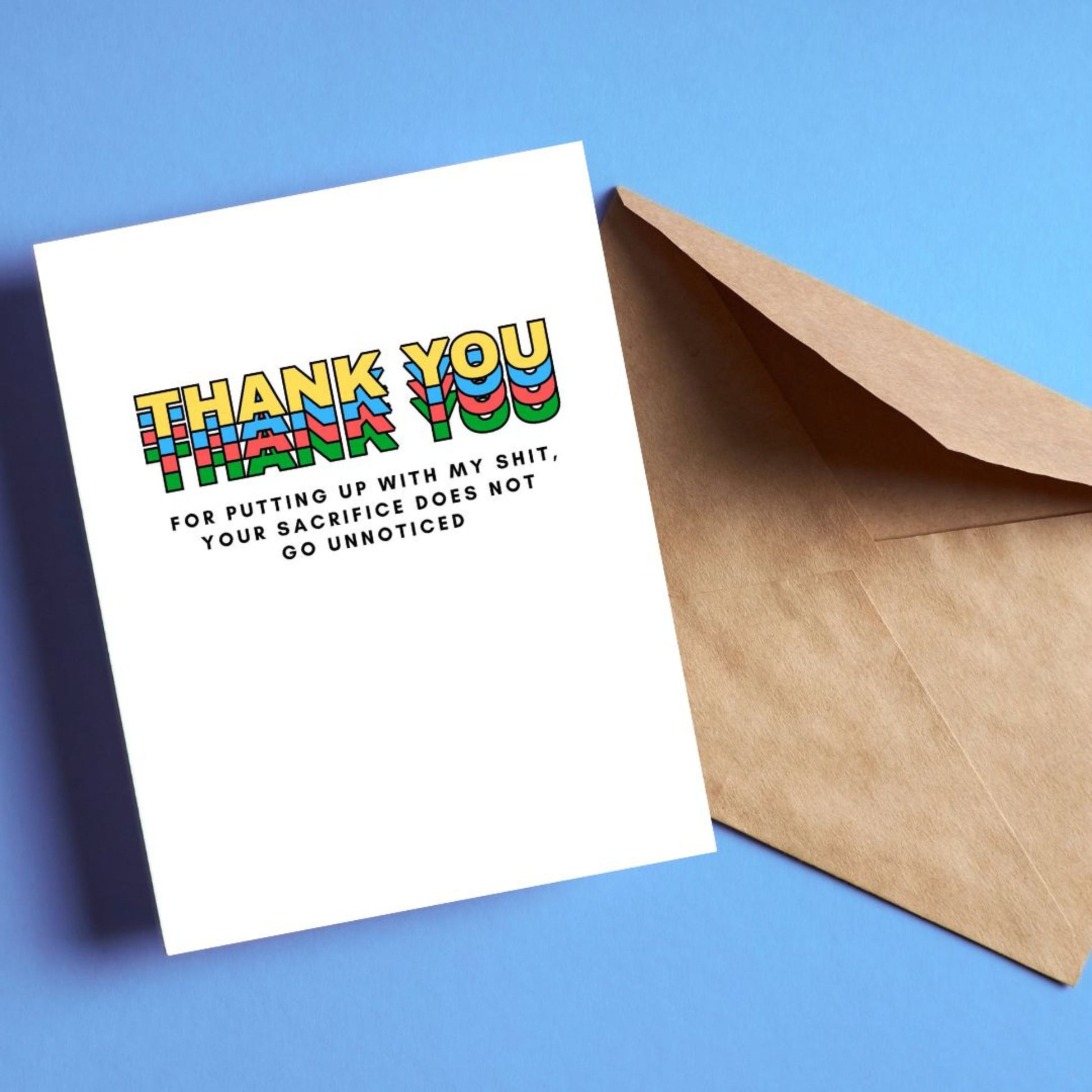 Greeting card with colorful block letters spelling Thank You and smaller text reading for putting up with my shit your sacrifice does not go unnoticed. Perfect for expressing gratitude with humor and a personal touch.