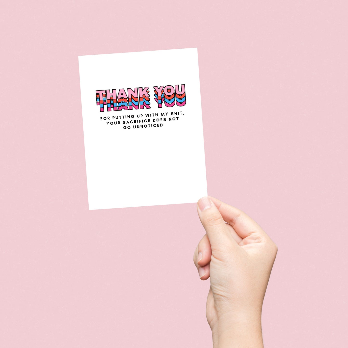 Greeting card with colorful block letters spelling Thank You and smaller text reading for putting up with my shit your sacrifice does not go unnoticed. Perfect for expressing gratitude with humor and a personal touch.
