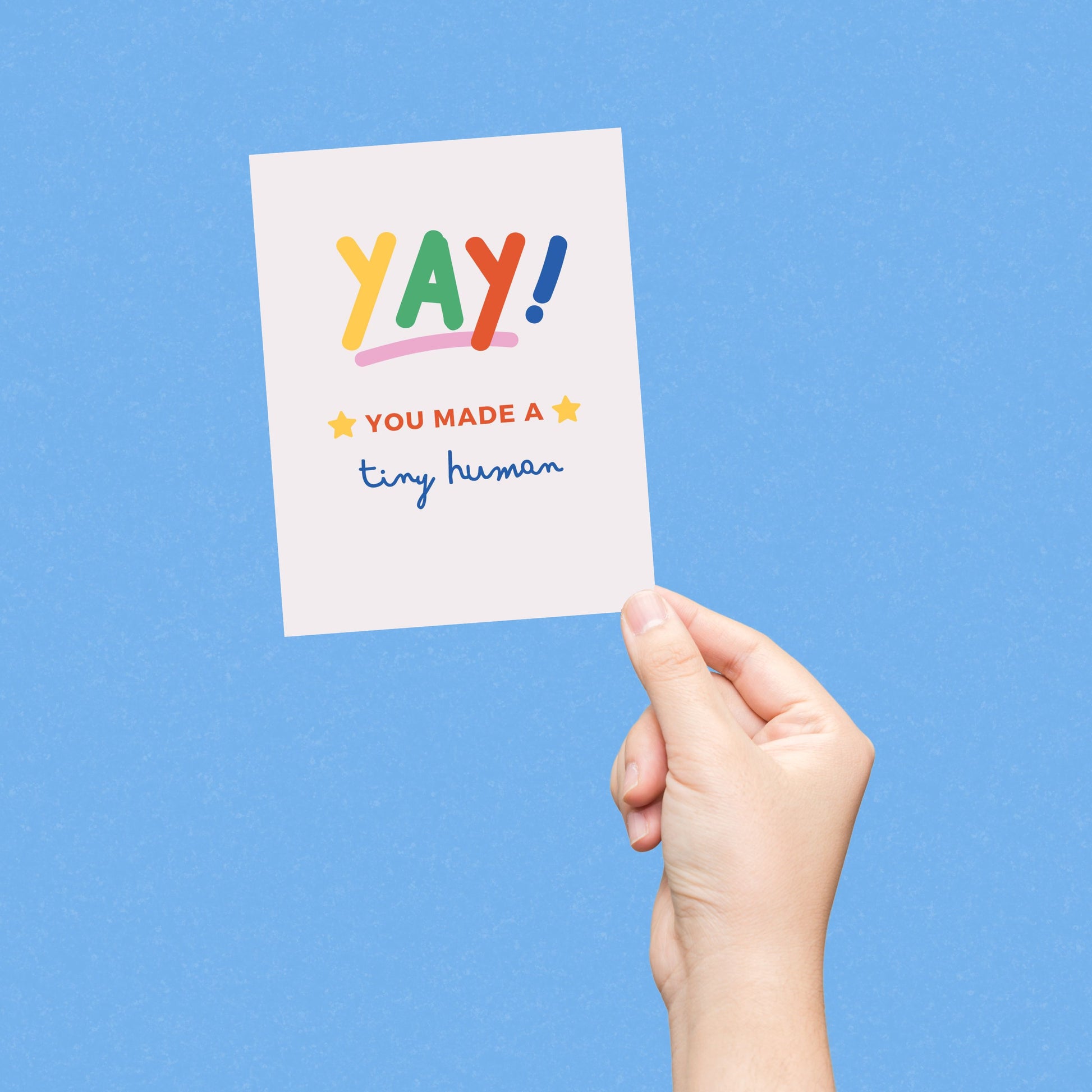 Yay You Made A Tiny Human greeting card with colorful letters and two stars, perfect for congratulating new parents.