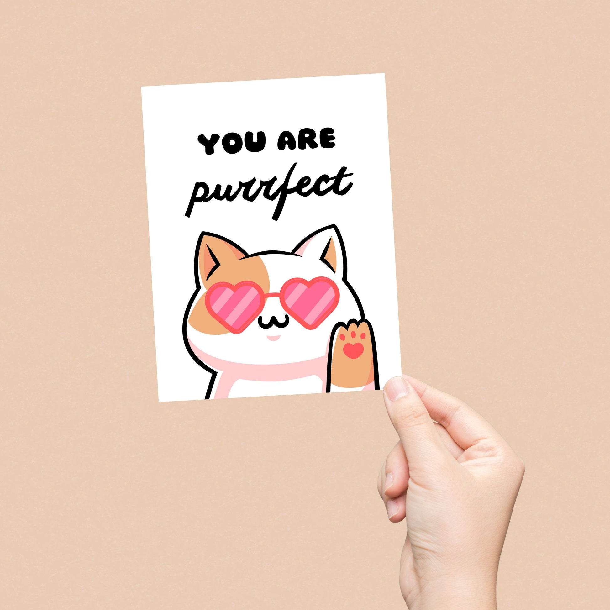 Cute cat greeting card with heart-shaped sunglasses and the pun "You Are Purrfect." Perfect for cat lovers, Valentine's Day, anniversaries, or just because. Funny and adorable feline-themed card to make someone smile.