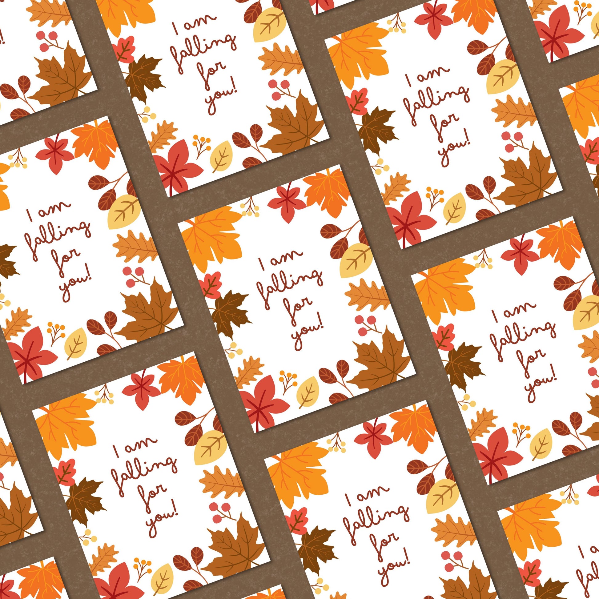 Greeting card with colorful fall leaves and the phrase 'I Am Falling For You' in bold letters. Perfect for expressing love and affection with a seasonal autumn theme. Ideal for romantic gestures or cozy fall greetings.