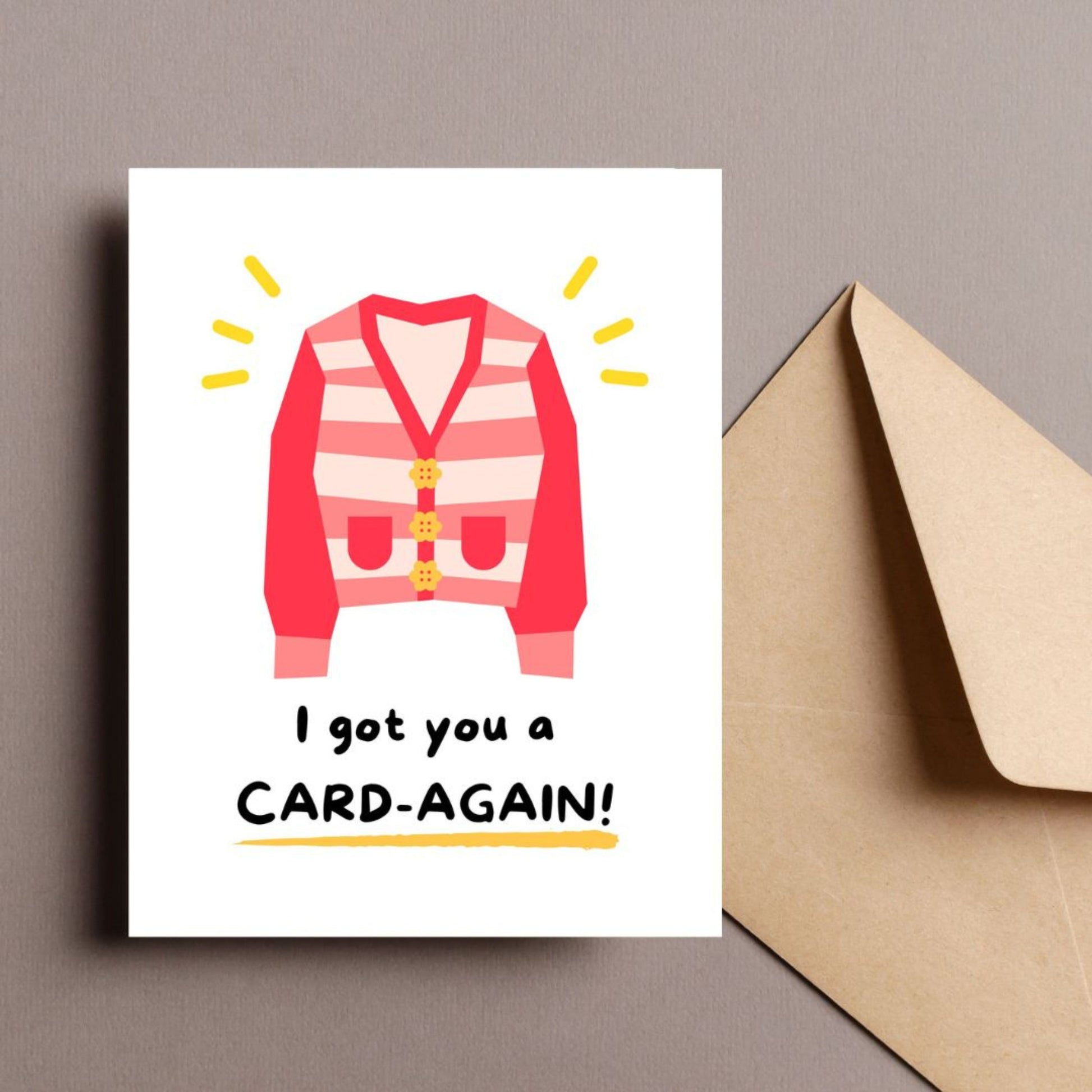 Cute greeting card featuring an illustration of a cozy cardigan with the punny phrase "I Got You A Card-Again." Perfect for birthdays, just-because moments, or to bring a smile with a clever play on words.