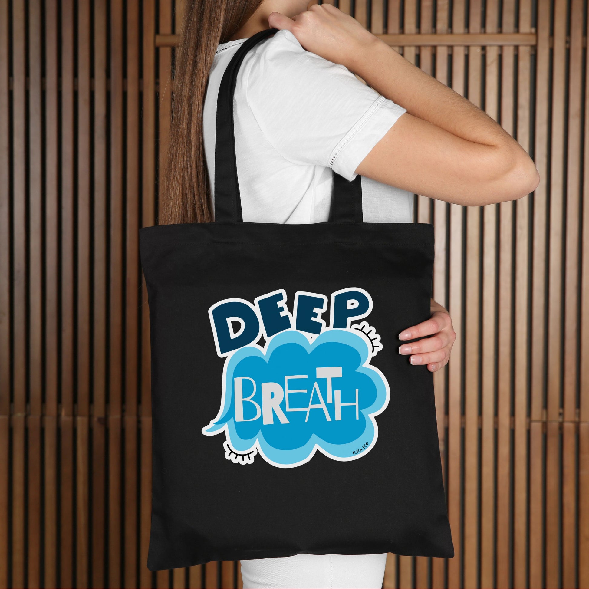 Deep Breath Tote Bag with original drawing of a serene cloud and the words Deep Breath written across it, perfect for carrying daily essentials and adding a touch of whimsy to your outfit.