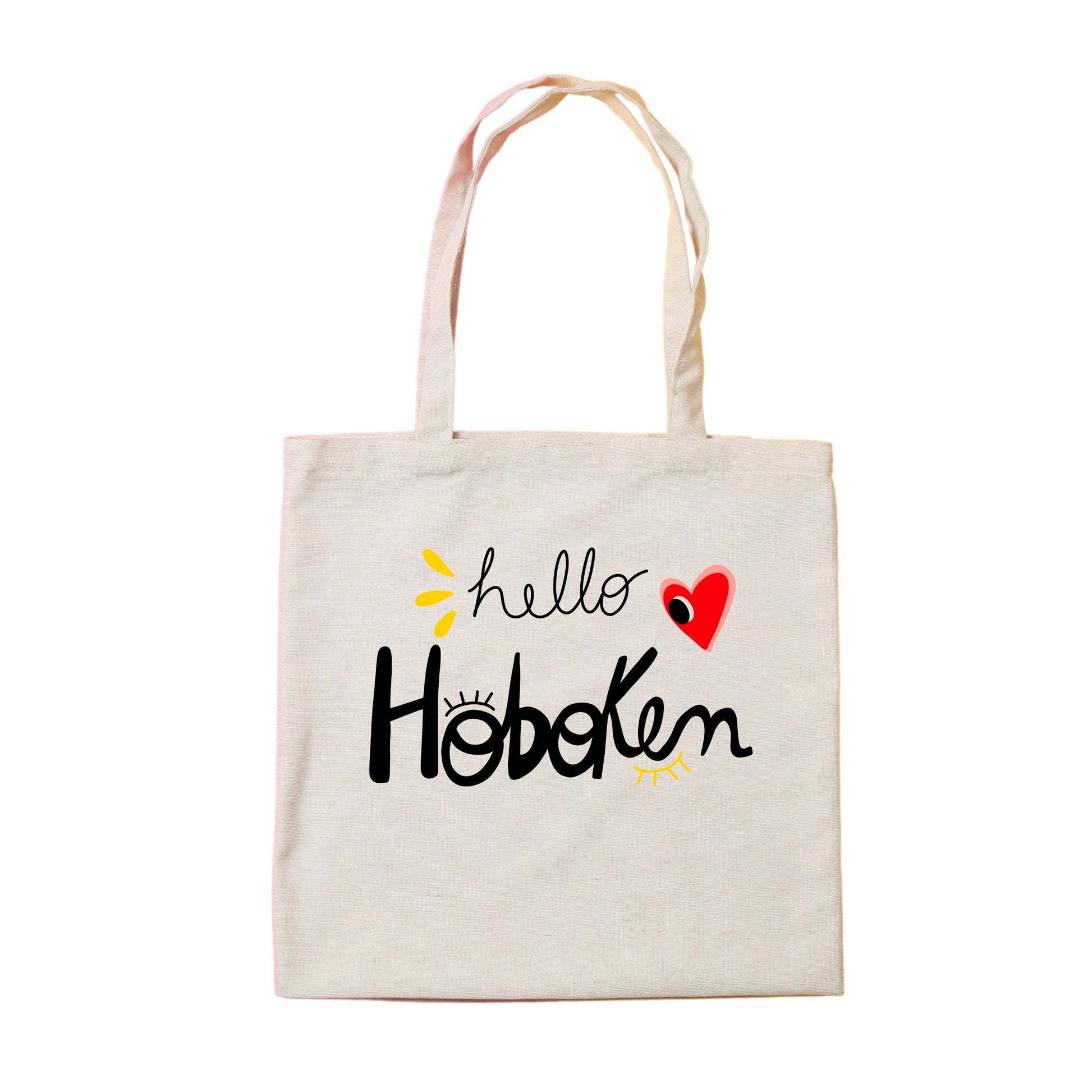 Tote bag with red heart and big eye design, called Hello Hoboken, representing Hoboken, New Jersey, perfect for stylish everyday use.