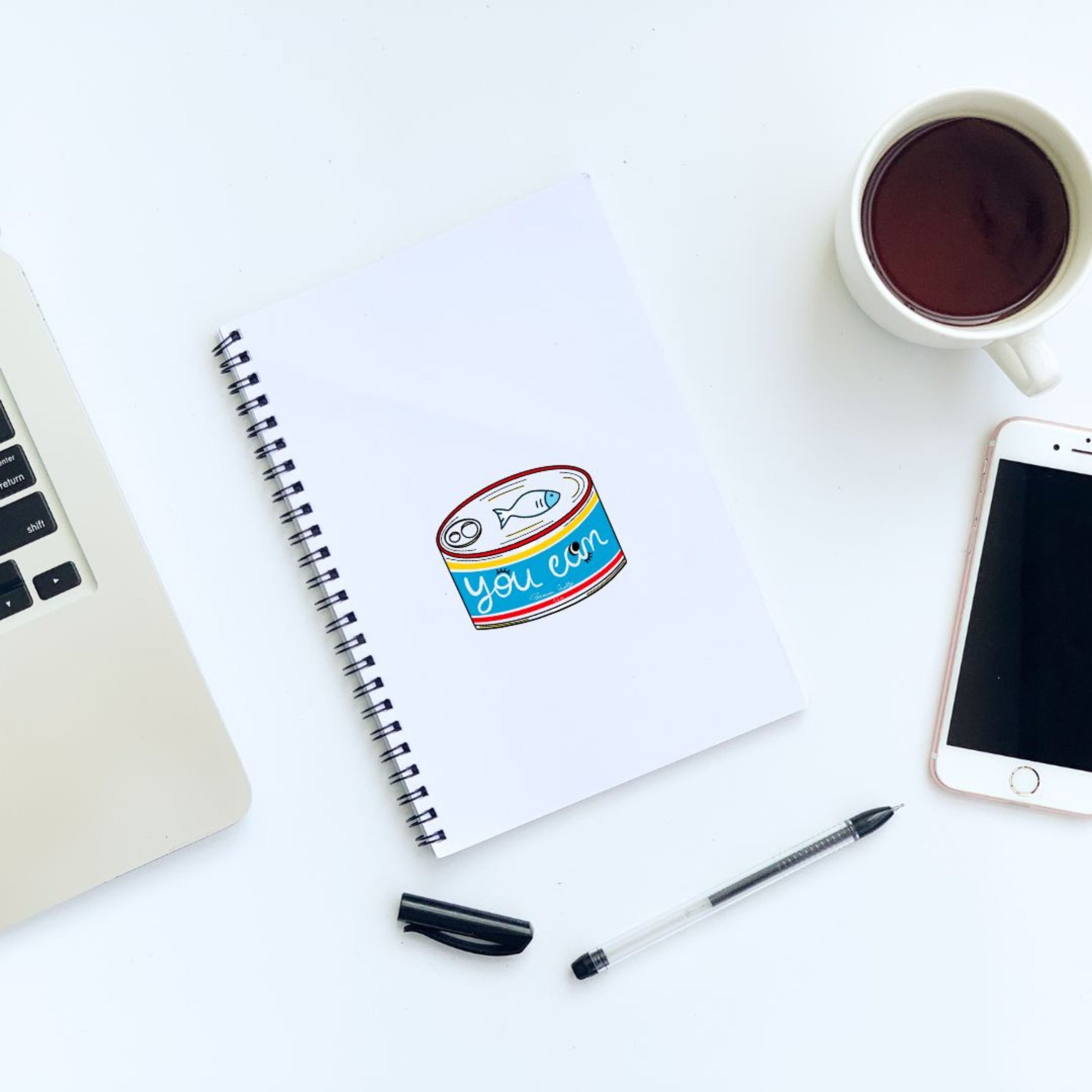 Blue tinned fish sticker with You Can written on it, serving as a quirky and motivational reminder for daily encouragement.