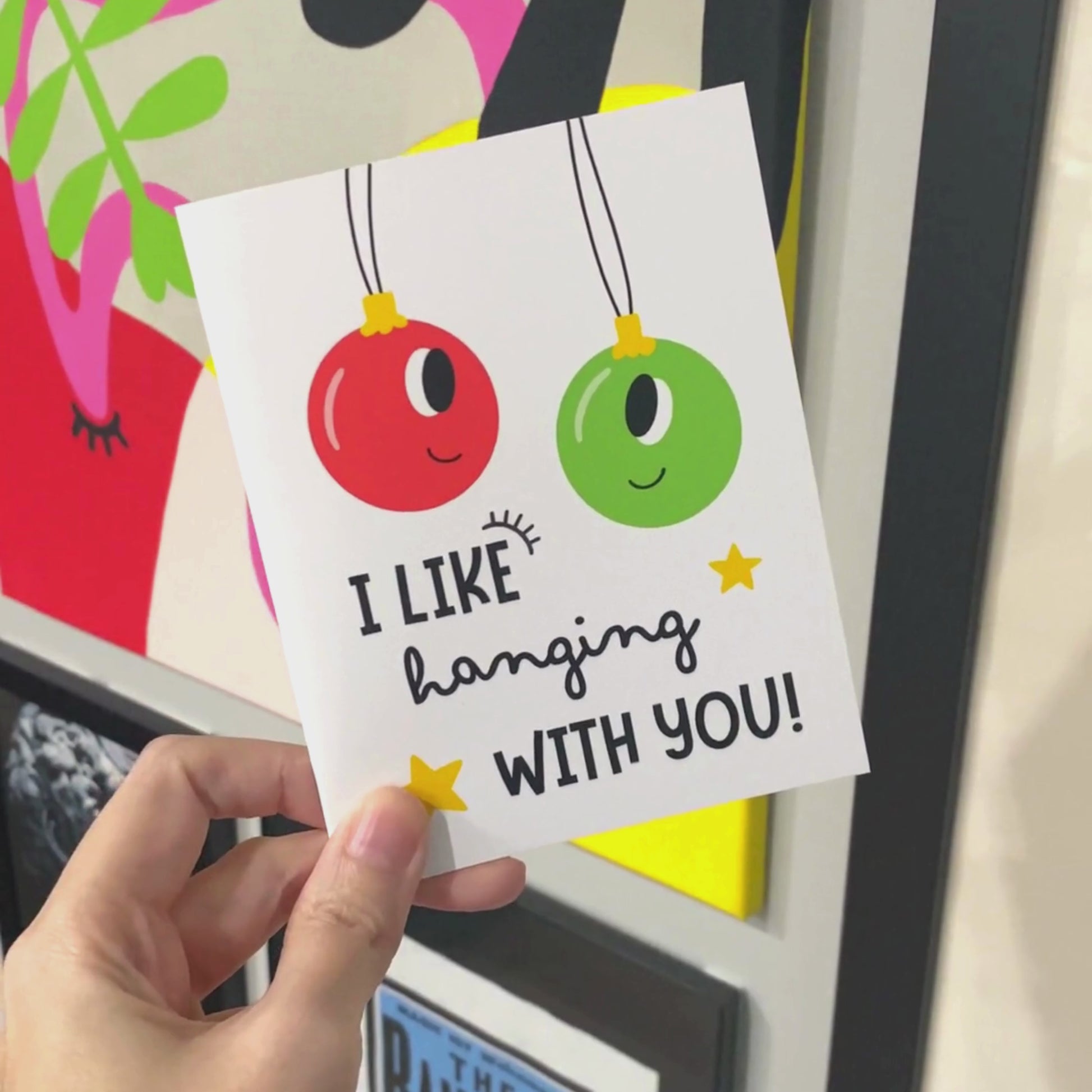 Christmas greeting card with two festive ornaments, one red and one green, and the playful phrase Like Hanging With You; in bold letters. Perfect for spreading holiday cheer, this funny card is ideal for friends, family, or loved ones.