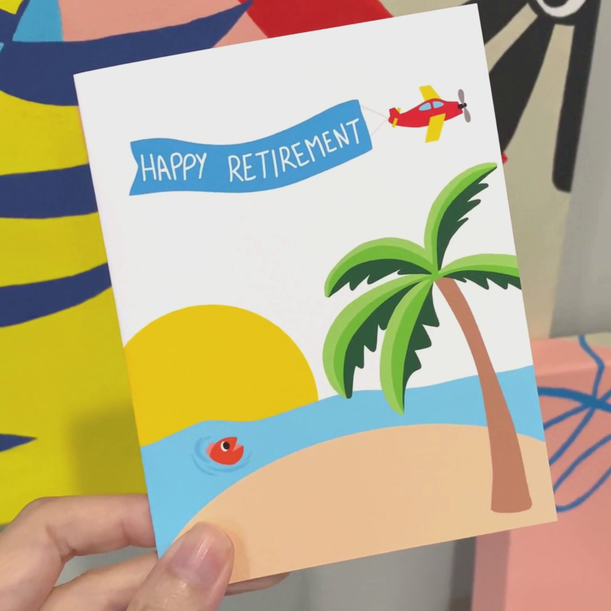 Greeting card with an original illustration of an island, a big sun, ocean, and an airplane holding a banner that reads Happy Retirement. Perfect for celebrating retirement with humor and a retro vibe.