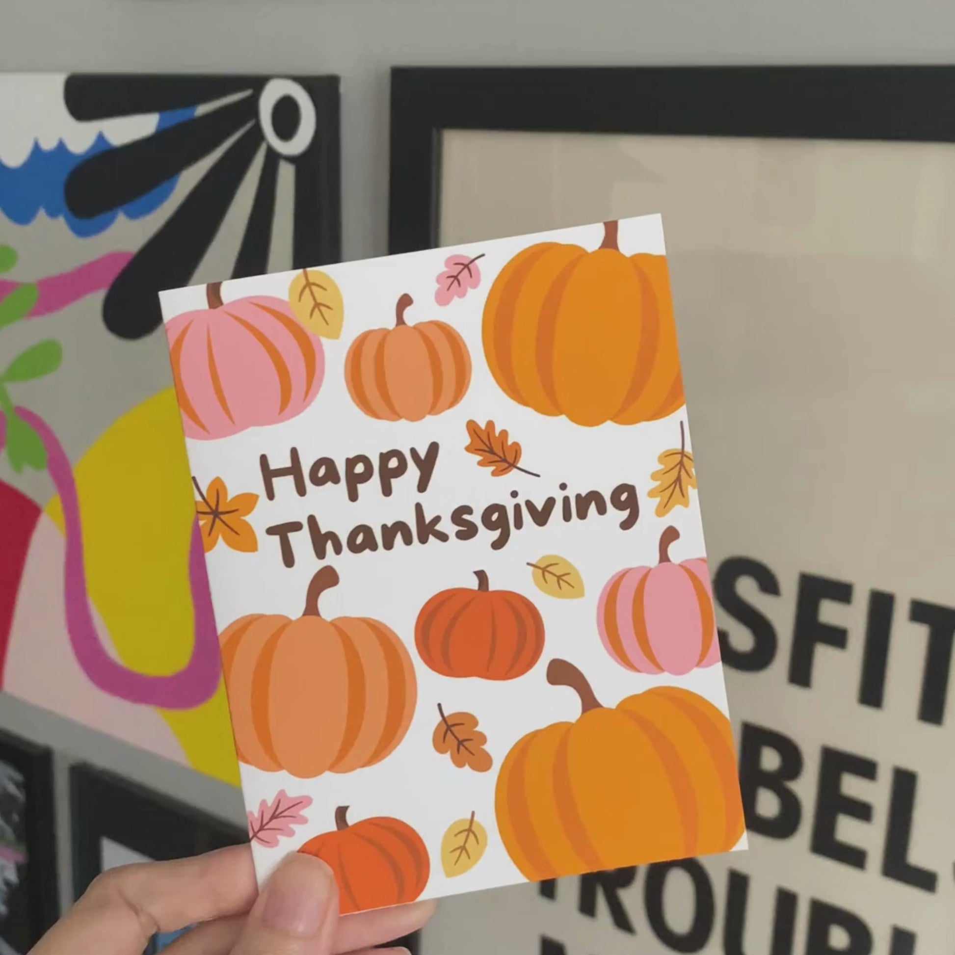 Thanksgiving greeting card with pumpkins and autumn leaves, featuring the phrase 'Happy Thanksgiving'. Festive fall-themed card perfect for expressing gratitude and sending holiday cheer.