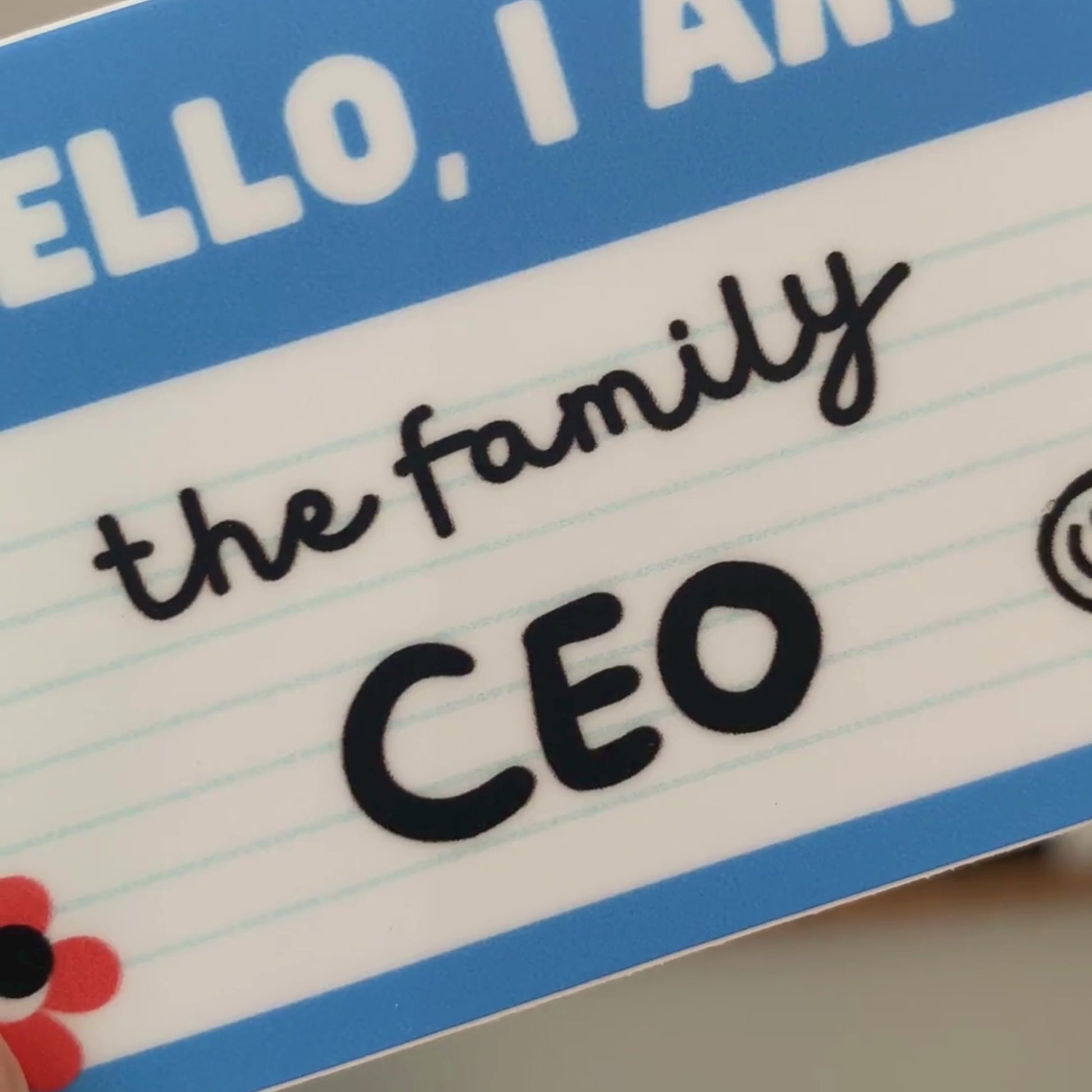 Blue name tag sticker with a fun phrase: Hello, I am The Family CEO written inside, perfect for anyone running the household with style and humor.