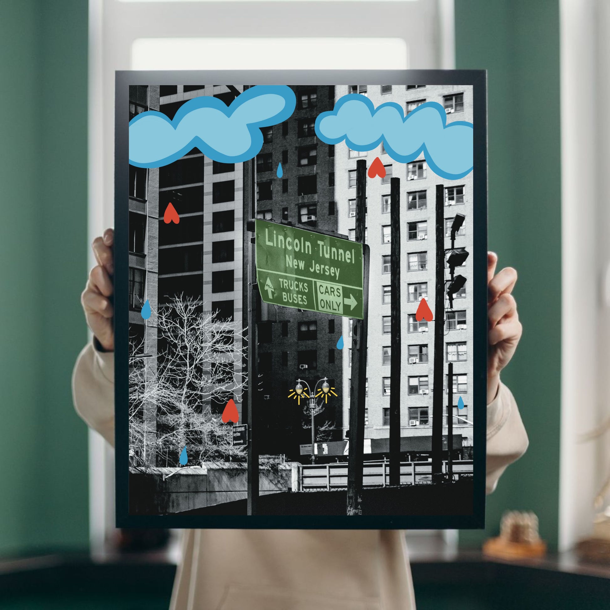 Black and white art print of the Lincoln Tunnel with illustrated clouds raining hearts and a glowing streetlight. Urban wall art mixing photography and illustration, perfect for New York lovers and modern home décor.