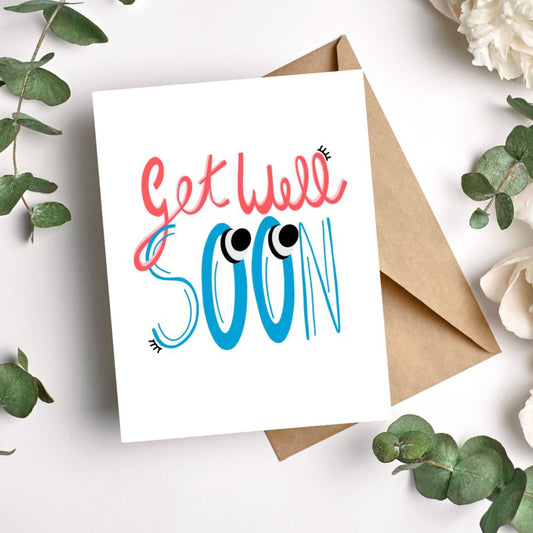 Greeting card with the phrase Get Well Soon featuring original lettering with two big googly eyes. Perfect for cheering up someone who is feeling under the weather with a playful and eye-catching touch.