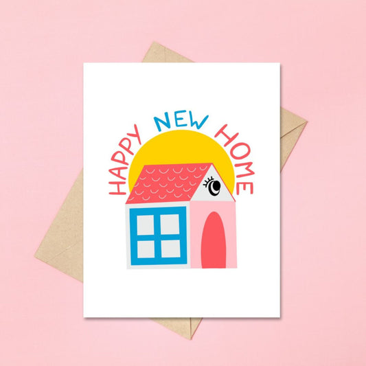 Greeting card with a cute, original drawing of a house and the phrase "Happy New Home." Perfect for celebrating new beginnings and housewarming occasions with humor and charm.