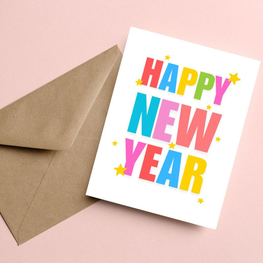 Colorful Happy New Year greeting card featuring bold rainbow letters spelling "Happy New Year," surrounded by festive stars on a white background. Perfect for spreading New Year's cheer.