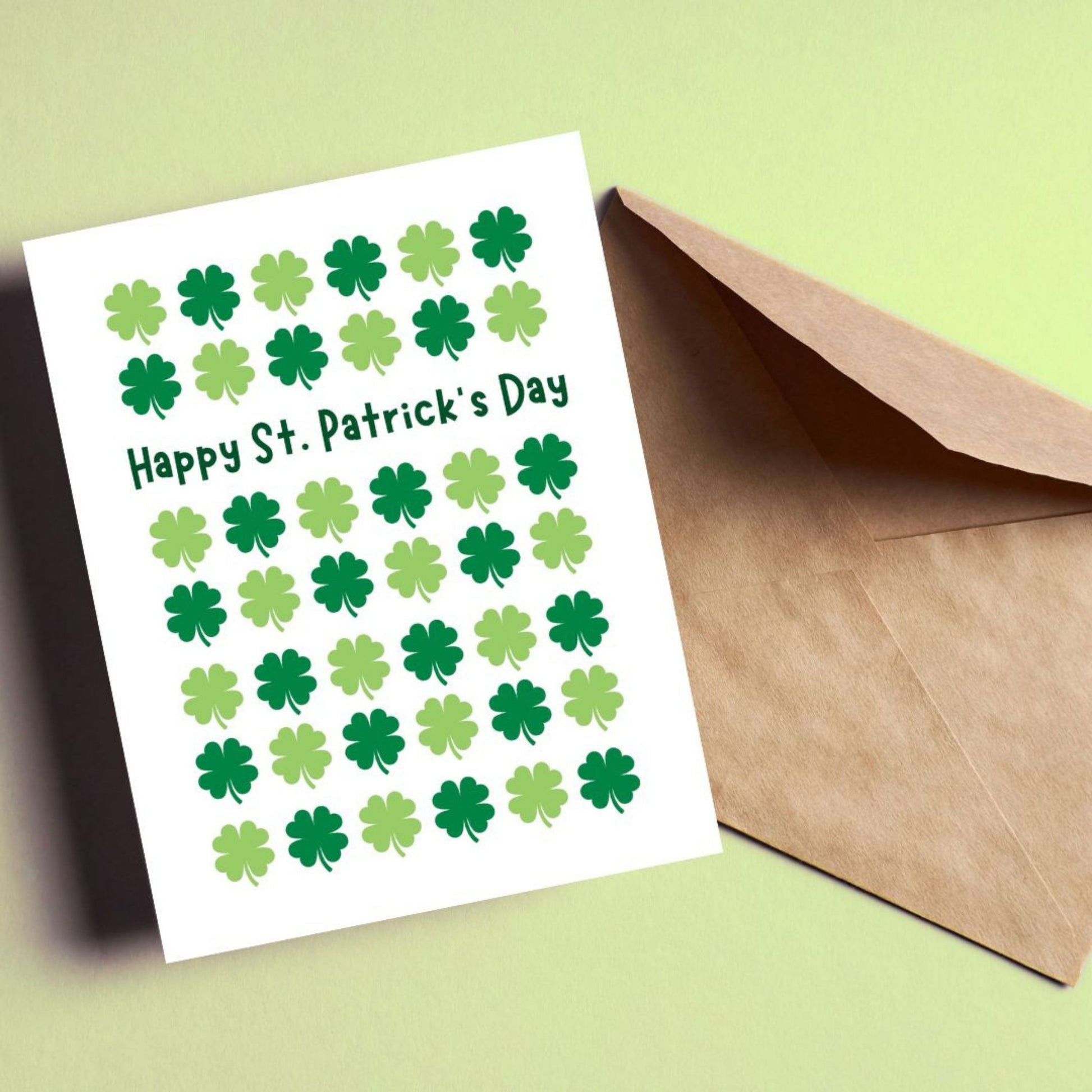 St. Patrick’s Day greeting card with lucky four-leaf clovers and the phrase "Happy St. Patrick’s Day" in festive lettering. Perfect for celebrating with friends and family. Fun, lucky, and great for spreading Irish cheer! Blank inside for your message.