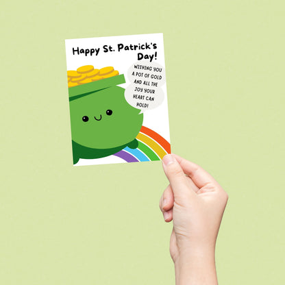 St. Patrick's Day greeting card with a cute smiling pot of gold and the phrase "Happy St. Patrick’s Day. Wishing You A Pot Of Gold And All The Joy Your Heart Can Hold." Perfect for spreading Irish luck and festive cheer. Great for friends and family! 🍀✨