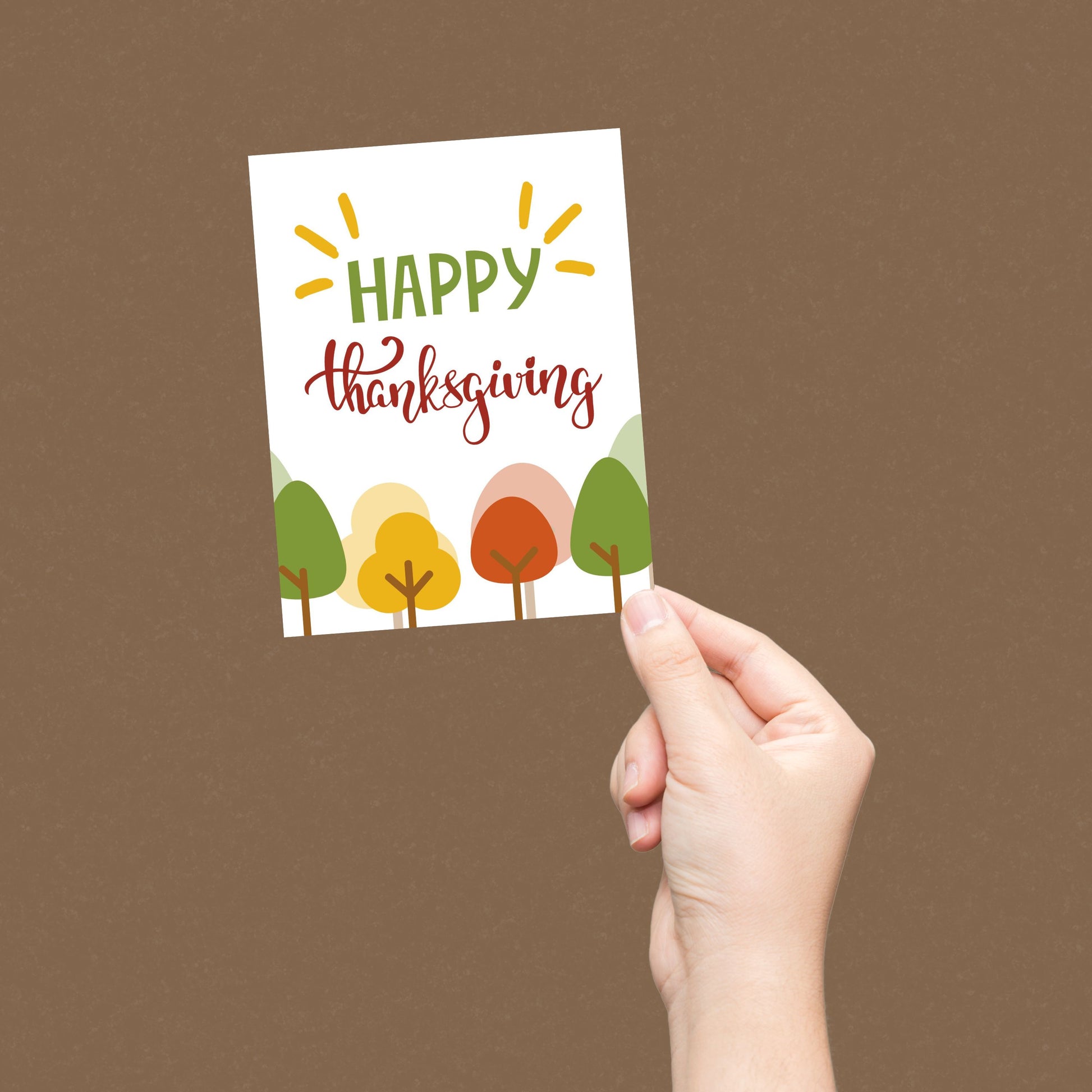 Cute Thanksgiving greeting card featuring fall trees with colorful leaves and the phrase Happy Thanksgiving. Perfect for sharing gratitude and adding a touch of humor to the holiday season.