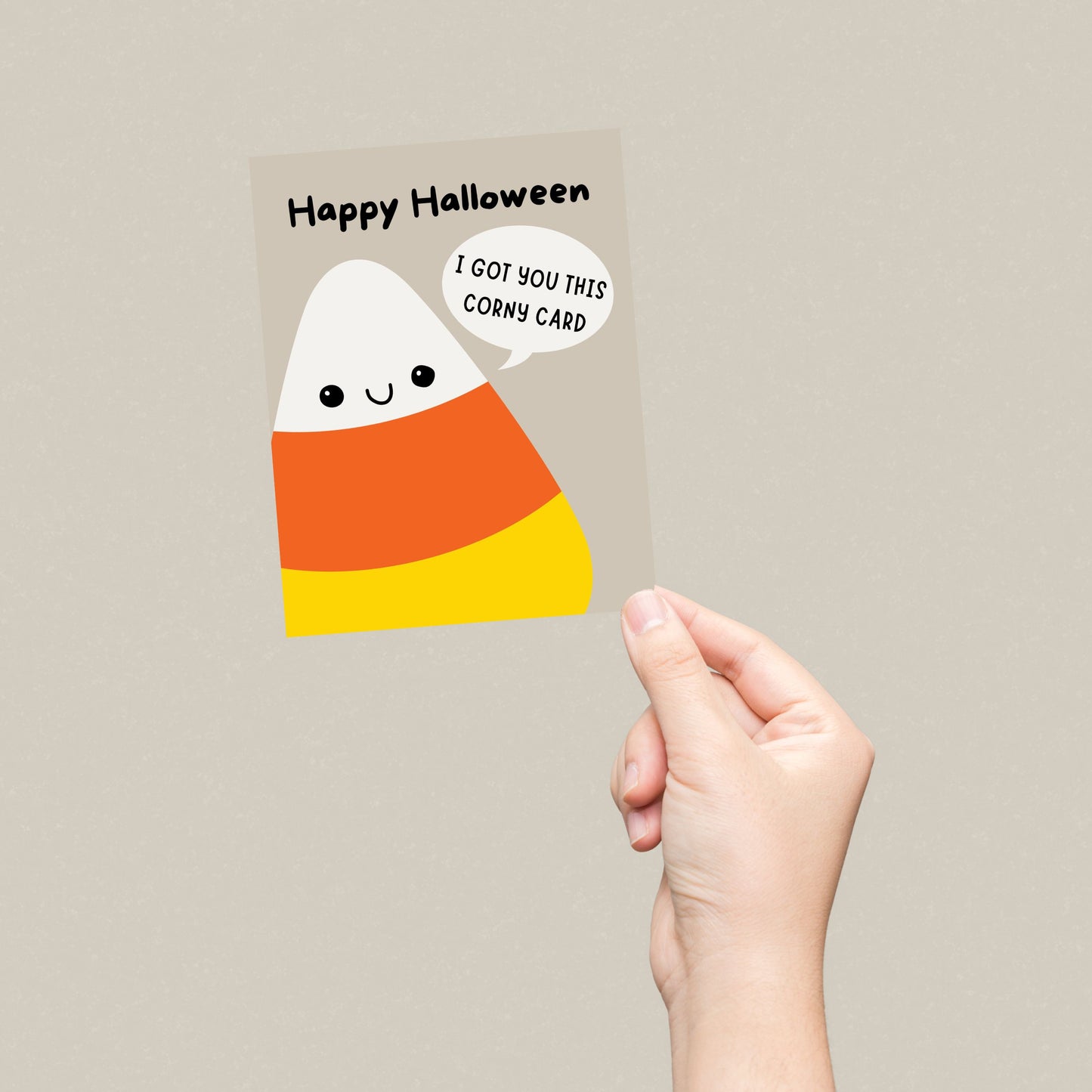 Halloween greeting card featuring a cute smiley candy corn with the phrase Happy Halloween, I Got You This Corny Card, perfect for spreading spooky fun and humor. Halloween pun greeting card, cute Halloween card for candy lovers.