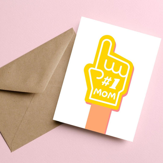 Number One Mom greeting card with a big yellow foam finger featuring #1 MOM, perfect for celebrating the best mom ever, Mother’s Day card, fun and playful mom appreciation card.