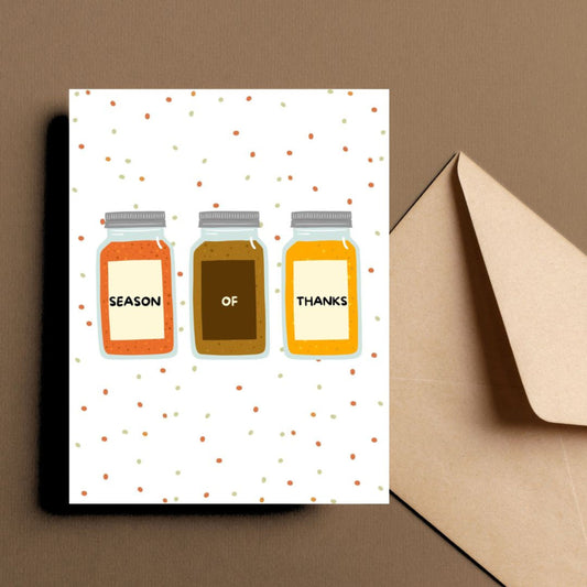 Thanksgiving greeting card featuring three spice jars with the phrase Season Of Thanks. Perfect for Thanksgiving wishes, humor, and food lovers. Spice-themed card adds a fun twist to holiday greetings with a nod to seasonal flavors.