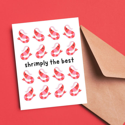 Cute greeting card featuring multiple cartoon shrimp illustrations with the playful phrase Shrimply the Best, perfect for thank you notes, encouragement, or celebrating someone special, printed on premium cardstock