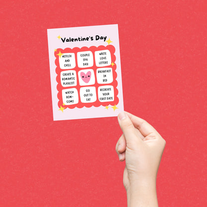 Valentine's Day greeting card featuring a cute bingo card design with fun date ideas, including Recreate Your First Date, Couple Spa Day, Watch Rom-Coms, and Netflix and Chill. Ideal for couples looking to add a fun twist to their celebration.