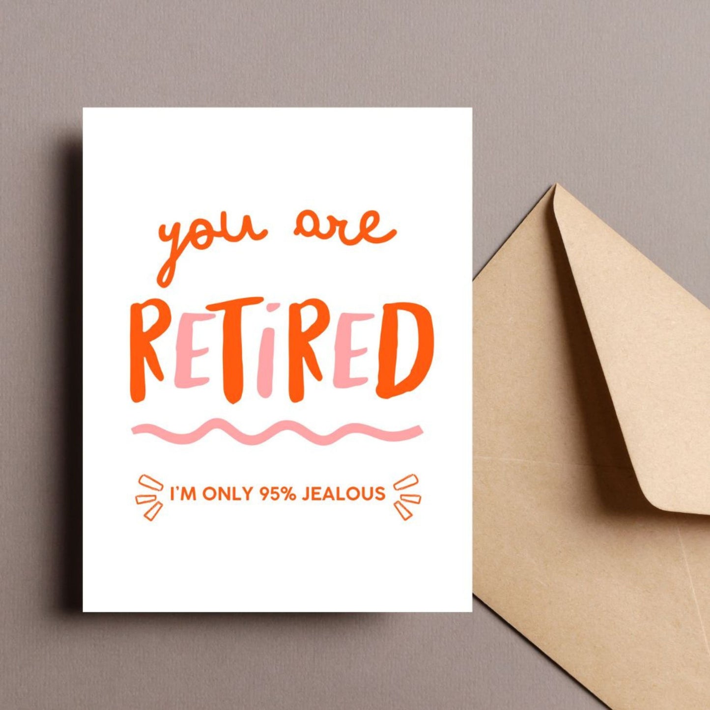 Greeting card with the phrase You Are Retired, I'm Only 95% Jealous in bold letters, perfect for a humorous retirement celebration.