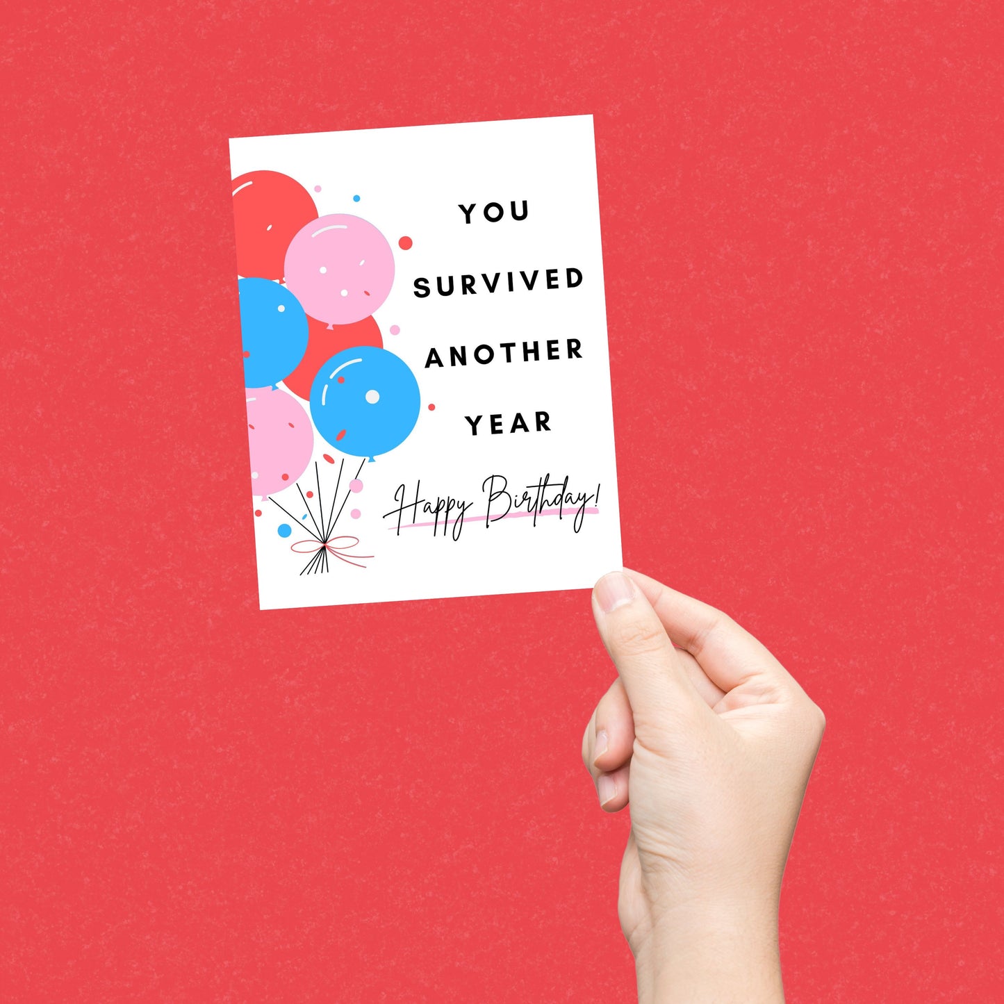 Funny birthday card with colorful balloons and the phrase "You Survived Another Year. Happy Birthday!" Celebrate another year with this playful and relatable greeting card.