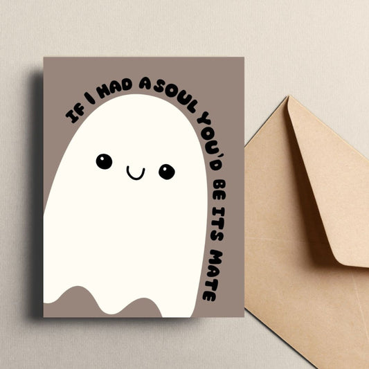 Cute Halloween greeting card featuring a playful ghost illustration with the phrase 'If I Had A Soul You'd Be Its Mate.' Perfect for sending a spooky and fun message to someone special. Ideal for Halloween or soulmate-themed greetings.