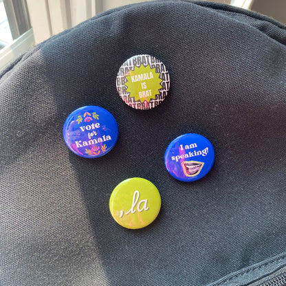 Kamala Harris campaign pin-back buttons, featuring slogans: 'Kamala is Brat,' 'Vote for Kamala,' 'La,' and 'I am Speaking.' Political accessory ideal for jackets, bags, and hats. Bold, high-quality buttons for showing your support in style.