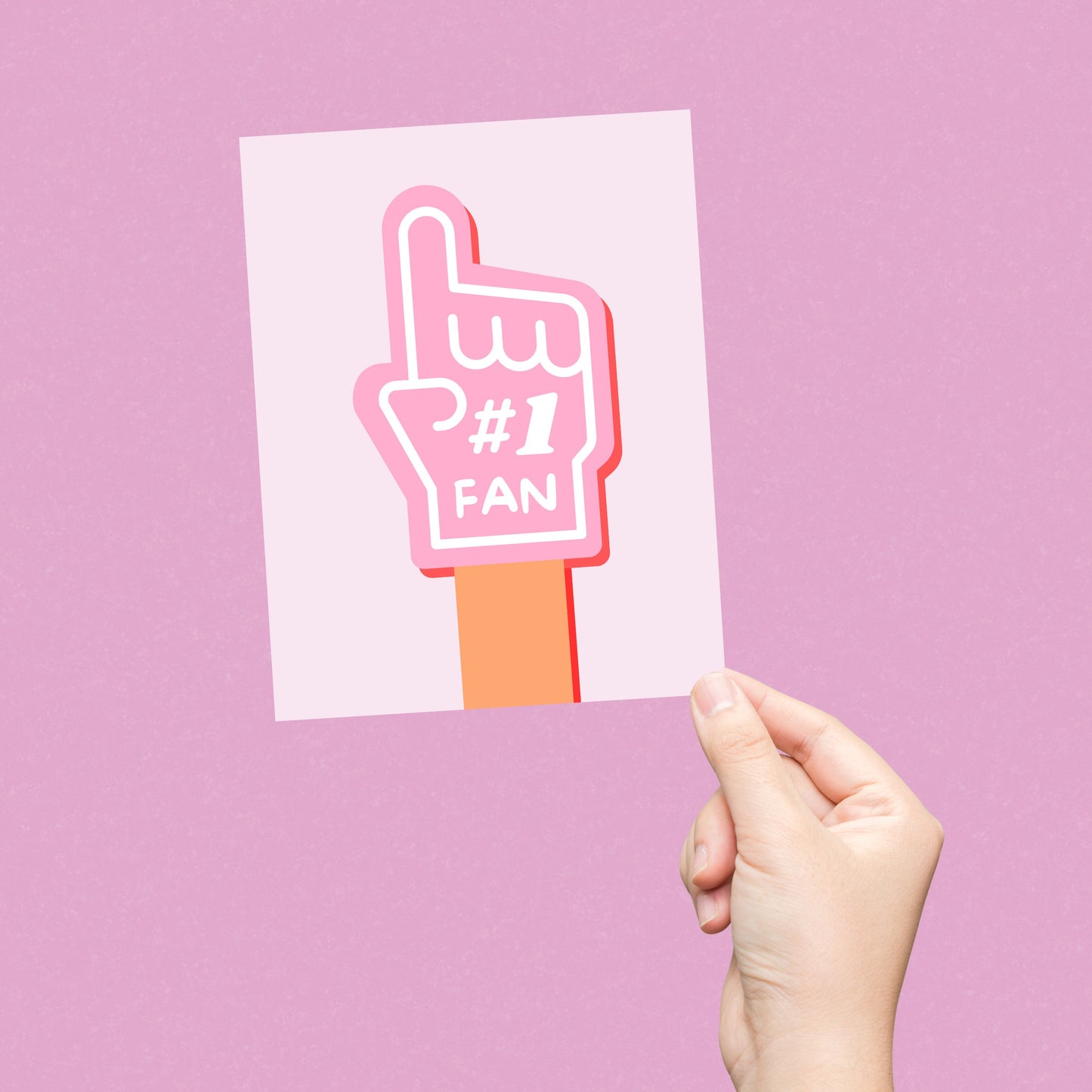 Greeting card with the phrase Number 1 Fan featuring a drawing of a pink foam hand with #1 Fan on it. Perfect for showing support and celebrating someone's awesomeness with cuteness and enthusiasm.