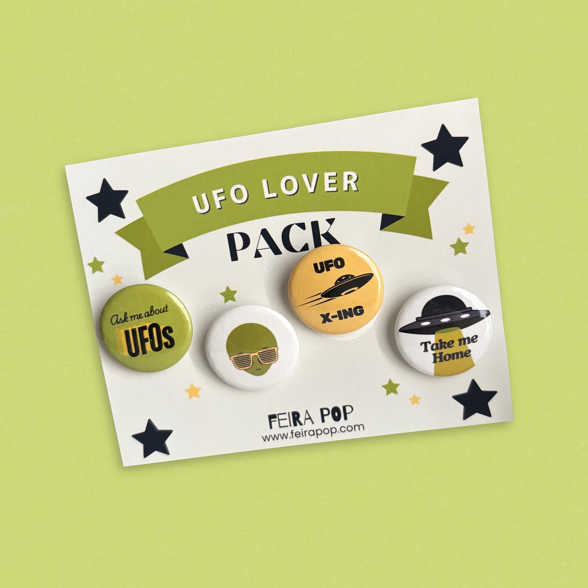 UFO Lover pin-back button pack featuring four funny alien designs: “Ask Me About UFOs,” cool alien with sunglasses, “UFO X-Ing,” and “Take Me Home.” Perfect gift for UFO lovers, sci-fi fans, and alien enthusiasts.