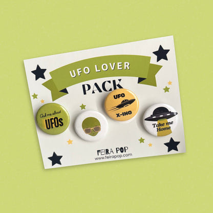 UFO Lover pin-back button pack featuring four funny alien designs: “Ask Me About UFOs,” cool alien with sunglasses, “UFO X-Ing,” and “Take Me Home.” Perfect gift for UFO lovers, sci-fi fans, and alien enthusiasts.