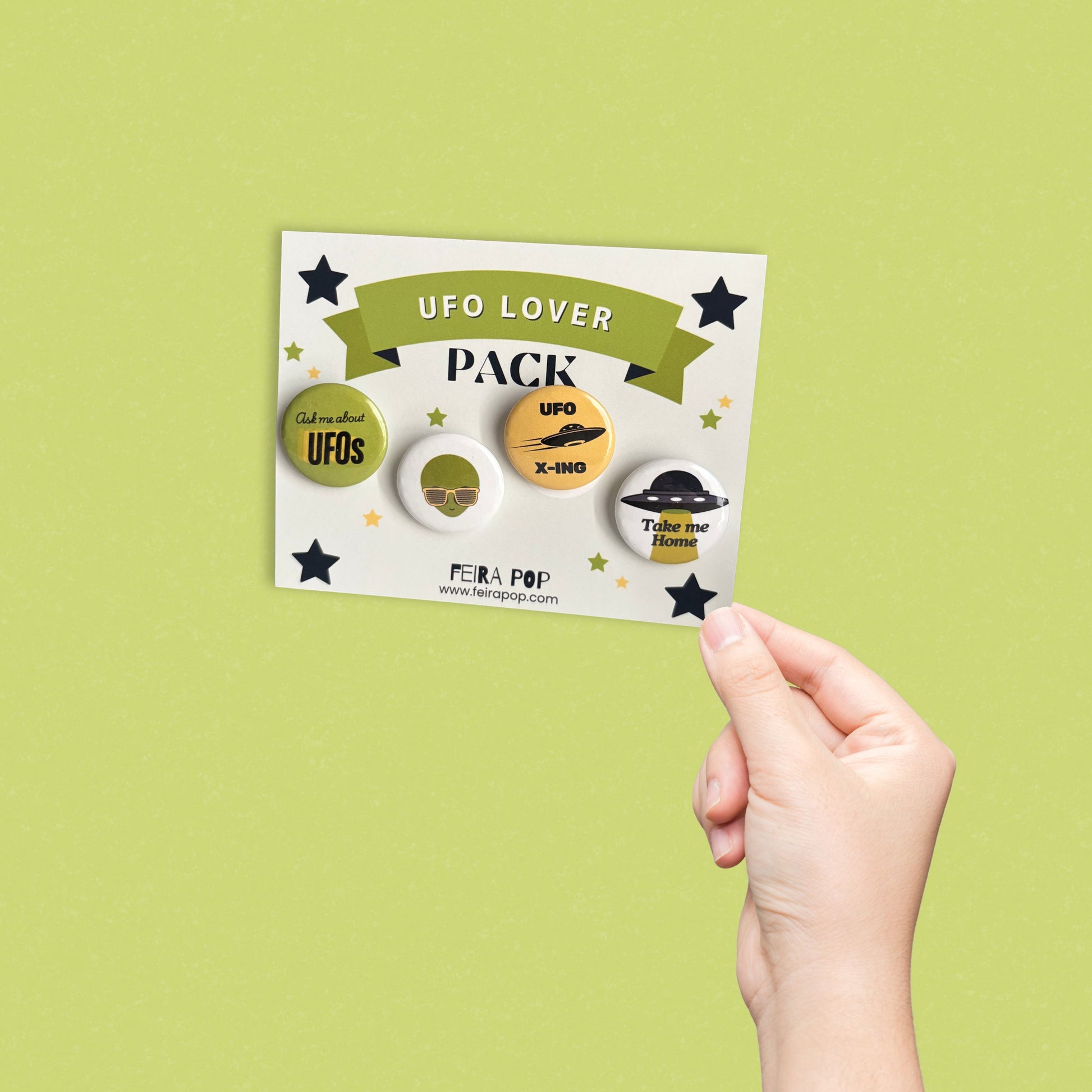 UFO Lover pin-back button pack featuring four funny alien designs: “Ask Me About UFOs,” cool alien with sunglasses, “UFO X-Ing,” and “Take Me Home.” Perfect gift for UFO lovers, sci-fi fans, and alien enthusiasts.