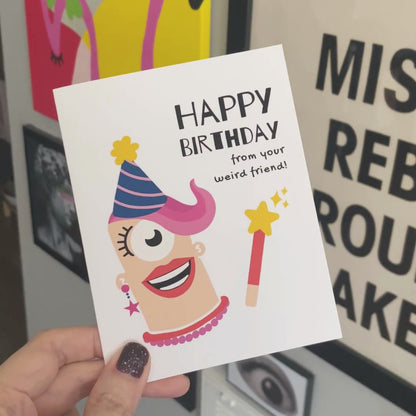 Greeting card with the phrase Happy Birthday From Your Weird Friend featuring bold letters and an original drawing of a colorful, quirky lady. Perfect for celebrating a friend’s birthday with humor and a touch of eccentricity.