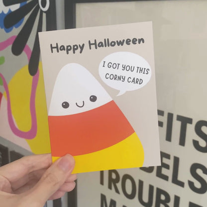 Halloween greeting card featuring a cute smiley candy corn with the phrase Happy Halloween, I Got You This Corny Card, perfect for spreading spooky fun and humor. Halloween pun greeting card, cute Halloween card for candy lovers.