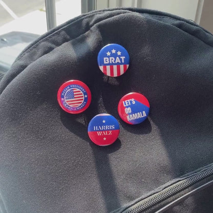 4-pin back button pack supporting Kamala Harris presidential run, featuring messages 'Madam President Kamala Harris,' 'Brat,' 'Let's Go Kamala,' and 'Harris/Walz.' Perfect for showing political support and style.