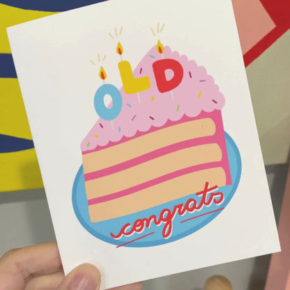 Greeting card with a cute, original drawing of a slice of birthday cake with three candles spelling out OLD. Perfect for humorous birthday celebrations and milestone birthdays.